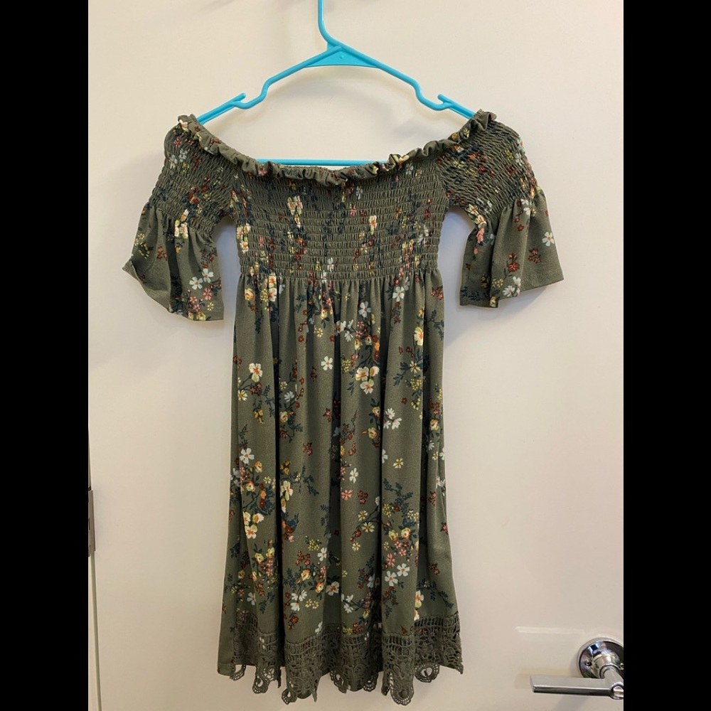 Green floral off the shoulder dress.